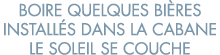 boire quelques bi res install s dans la cabane le soleil se couche 